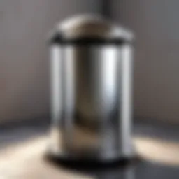 Sleek stainless steel cylindrical trash can